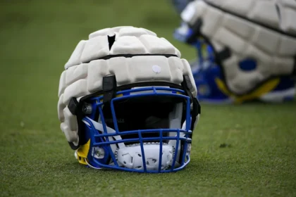 Pastor Justin Buzzard, 47, joins San Jose City College roster as defensive end.