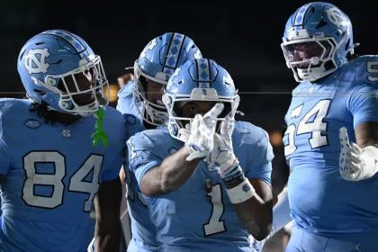 UNC's offensive duo aims to impress Bill Belichick and lead Tar Heels against TCU in college football opener.