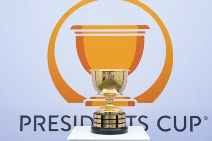 U.S. attempts to rally in Presidents Cup singles play against Internationals' lead.