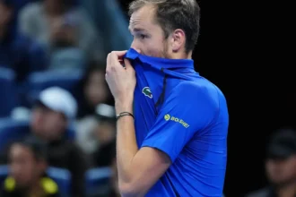 Daniil Medvedev disqualified vs. Novak Djokovic after swatting ball into stands and hitting fan in the face