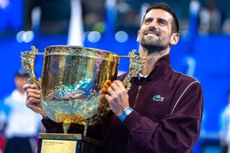 Djokovic wins 7th China Open title after injured De Minaur retires