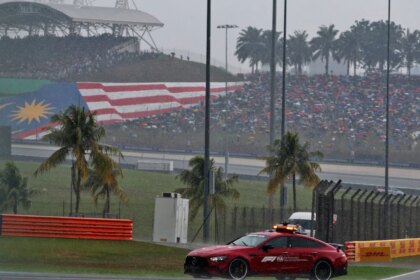 Start of F1 Bahrain GP in Malaysia delayed after heavy rainstorm