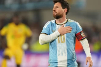 Lionel Messi scores final international goal in last game for Argentina amid emotional pregame moments.