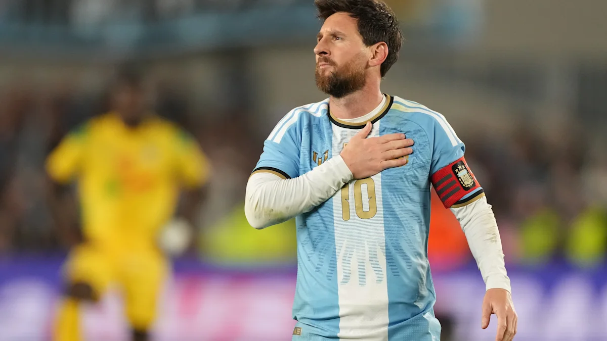 Lionel Messi scores final international goal in last game for Argentina amid emotional pregame moments.